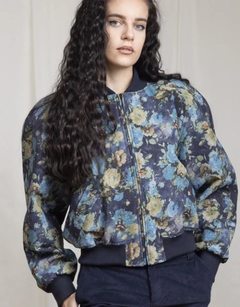 Model in a floral bomber jacket